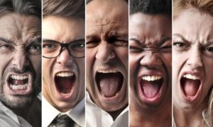 close up of five angry people's faces - anger is often a warning sign of workplace violence