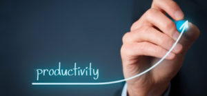hand drawing a upward growth curve fot the word productivity
