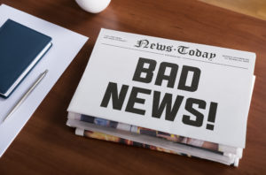 newspaper headline: bad news