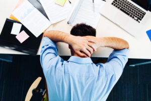 stressed employee - often an ealy sign or workplace violence