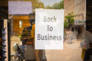 sign on door" back to business"