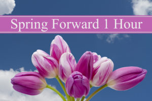 pink tulips and a banner reading "spring forward one hour" illustrate this post about March dates & events
