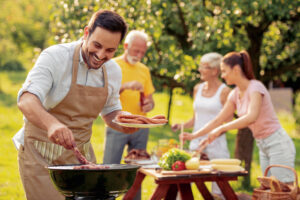 family barbecue to illustrate July key dates post